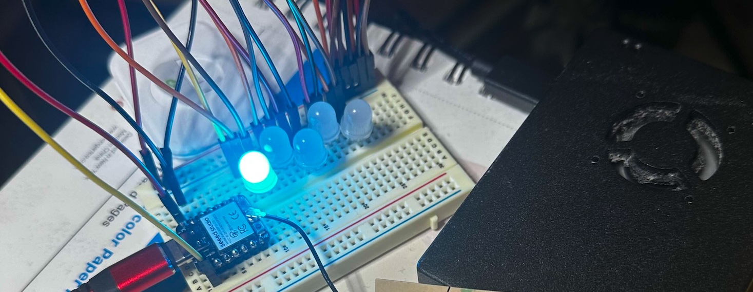 esp32 with wires and LEDs on a breadboard